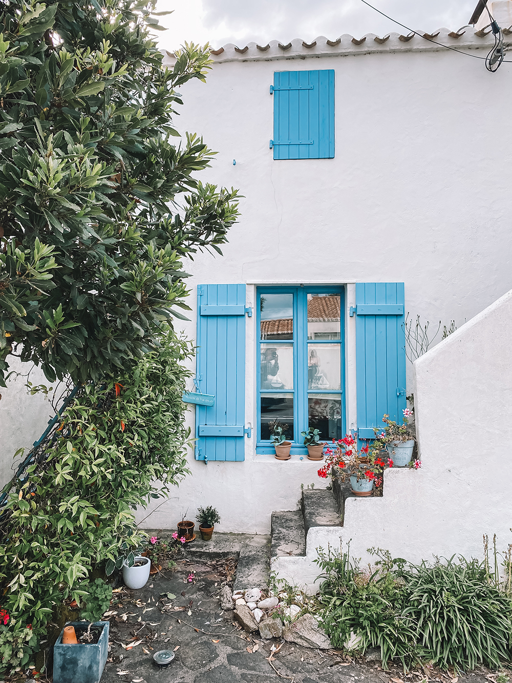 De huisjes op Île de Noirmoutier hebben allemaal dezelfde blauwe of groene luiken.